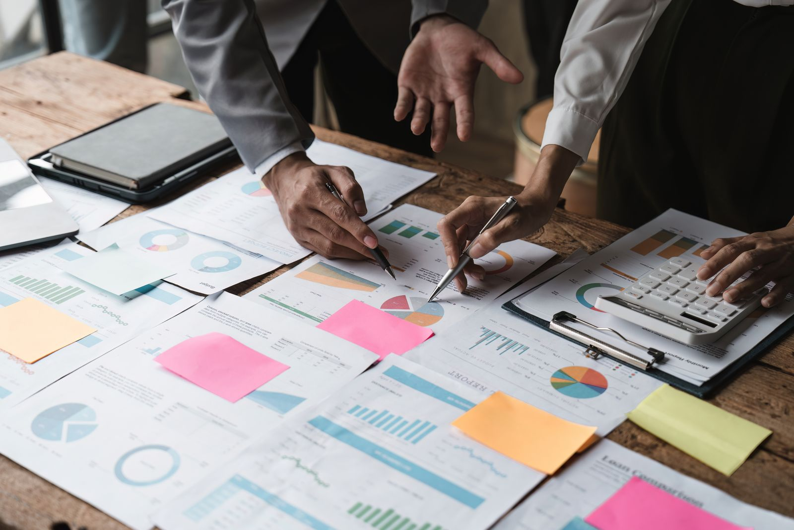 Consultants reviewing market analysis